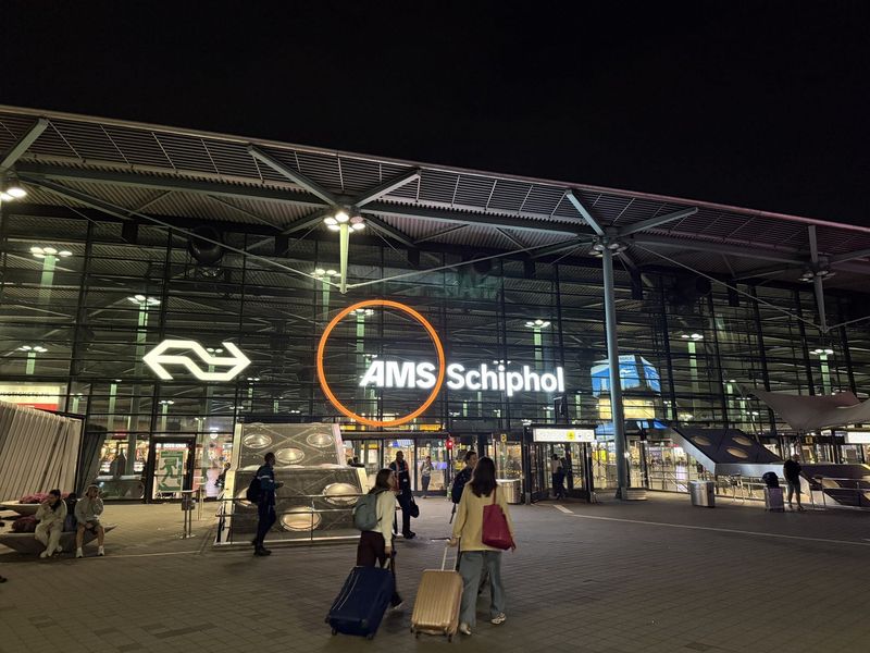 Still pitch dark at Schiphol Plaza: the mission to Naples begins.