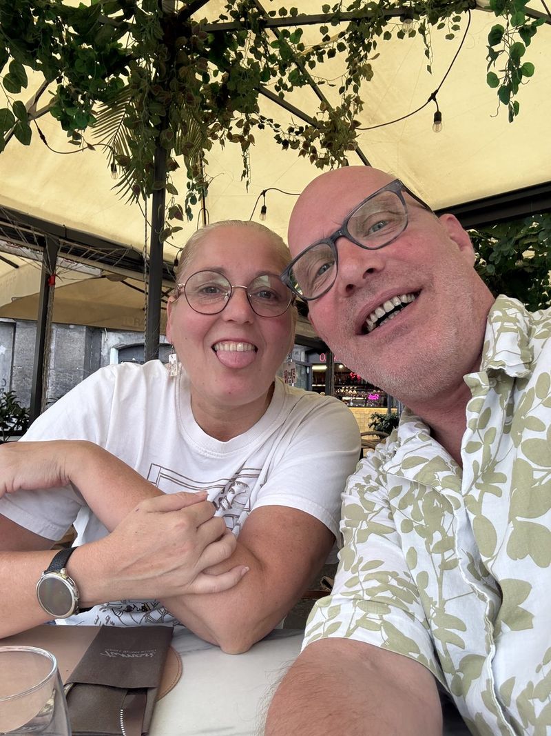 Marc and Liek on the terrace at Tumasi, Liek with a fruit mocktail.