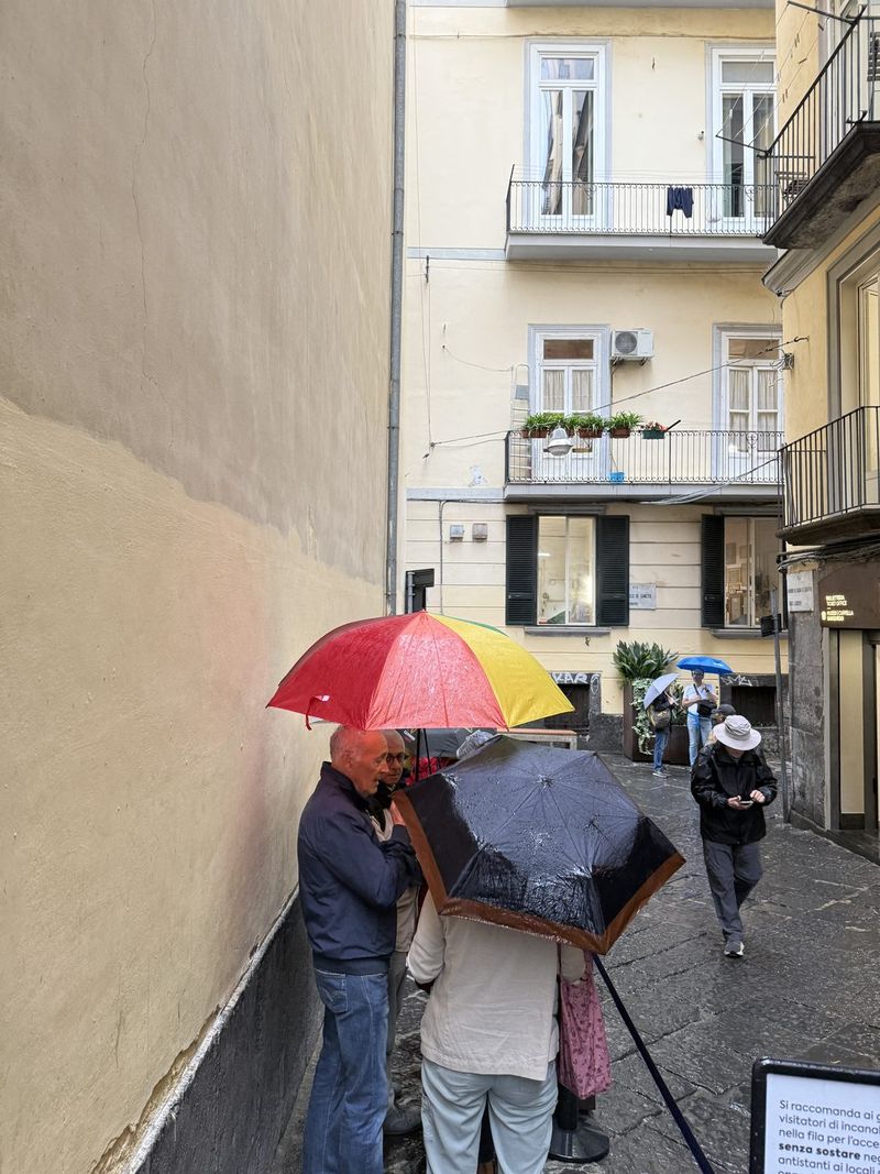 Queueing in the rain for the Cappella Sansevero. Luckily not for long.