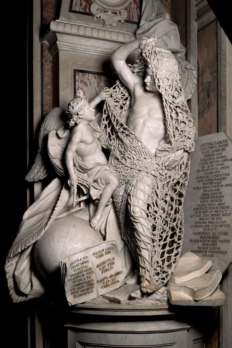The Disinganno by Francesco Queirolo: a man struggles free from a net carved entirely from marble. Photo: © Museo Cappella Sansevero