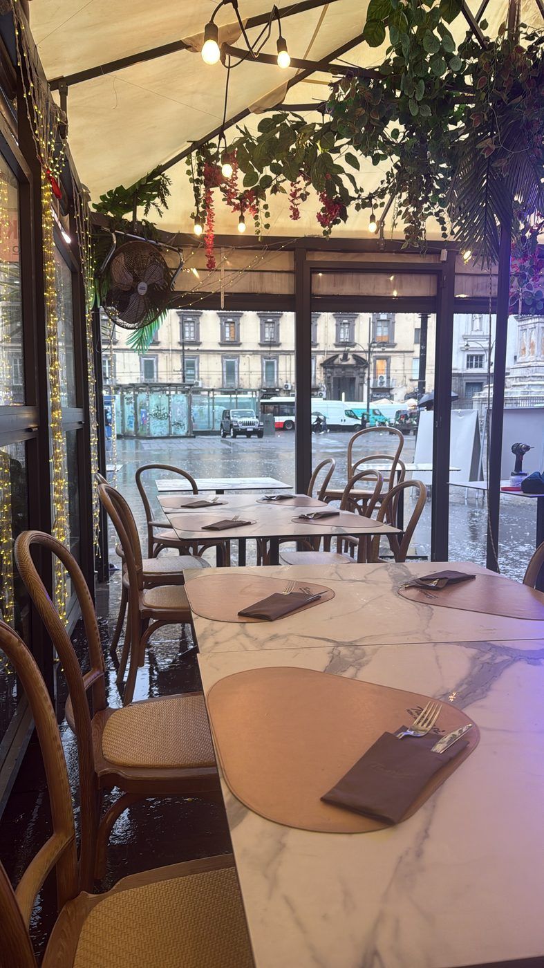 So off to Tumasi on Piazza Dante instead, dry behind the glass.