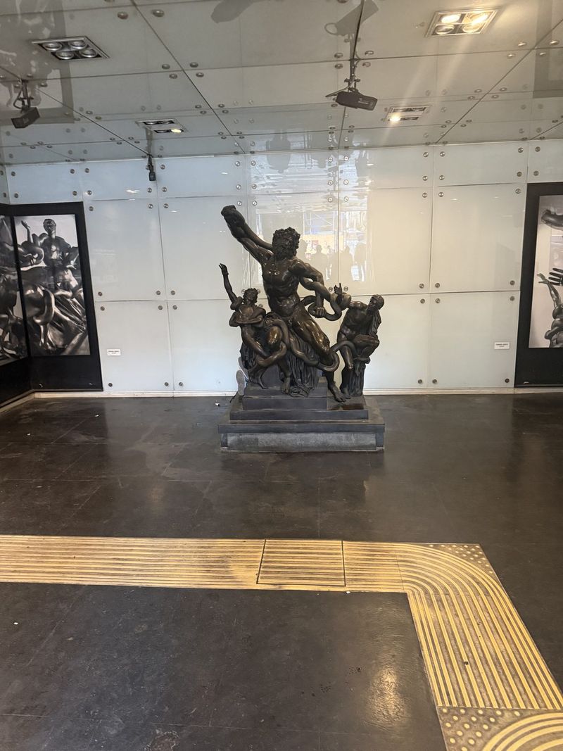 Museo metro station displays copies of statues from the museum above.