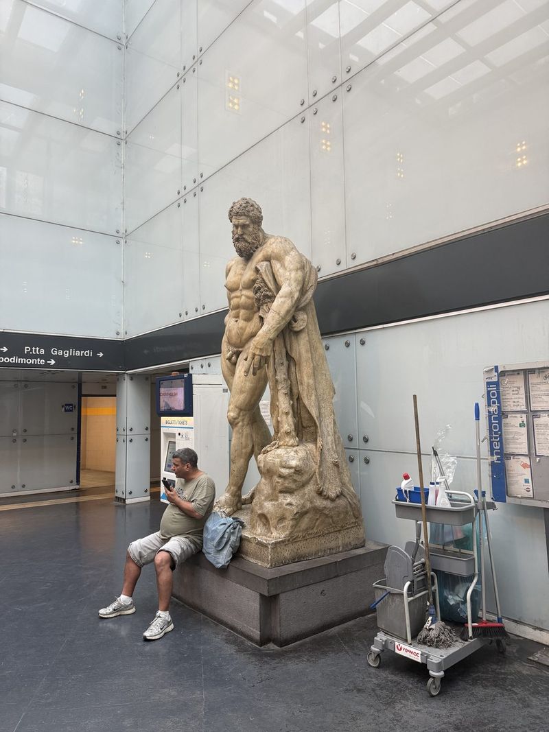 A copy of the Farnese Hercules, right there in the metro station. The original is in the MANN.
