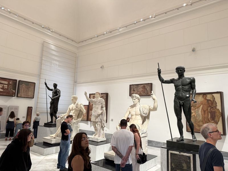 A room full of bronze and marble statues.