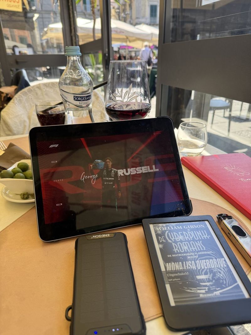 At Tumasi, with Formula 1 on the iPad and a glass of wine.